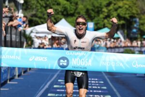 Matt Hauser winning the Garmin Noosa Triathlon – Photo Korupt Vision