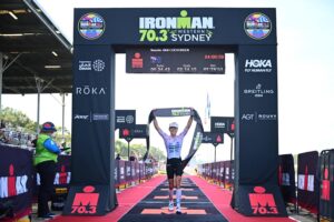 Natalie Van Coevorden claiming the title at IRONMAN 70.3 Western Sydney - Photo Alex Polizzi